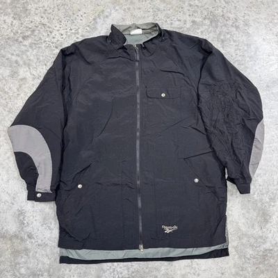 Chaqueta Reebok De Colección Para Hombre Grande Negra Nylon Larga Rompevientos Logo Abrigo Años 90 Foto 1 de 4