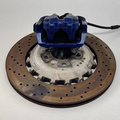 Pinza de freno trasera izquierda conductor BMW M5 M6 F06 F10 F12 F13 12-16 con rotor azul OEM Foto 1 de 4