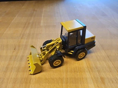 Conrad Radlader Hanomag 15F Modell 2427 unbespielt  1:50 Modellauto - Bild 1 von 4