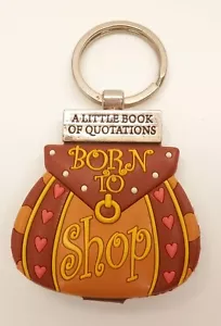 Llavero de historia y heráldica ""Born to Shop"" de pequeño libro de citas - Imagen 1 de 2