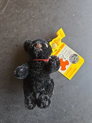 Mini oso de peluche NEGRO STEIFF Alemania genuino mohair con etiqueta Foto 1 de 4