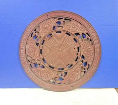 Antiguo estufa de ventilación de rejilla de piso rojo de hierro fundido Mfg Co Foto 1 de 4