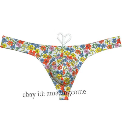 Hombres Bikini Traje de baño Forro de seda helada Tanga de natación Traje de baño Ropa de playa Calzoncillos de surf Foto 1 de 4