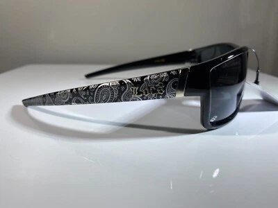 Men's sunglasses with black lenses and black and white bandana side arms - Image 1 of 4