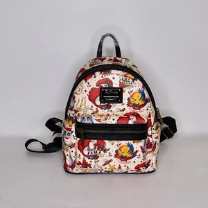 ¡¡NUEVO CON ETIQUETAS!! Mini Mochila LOUNGEFLY x Disney Ariel Sirenita Tatuaje AOP Princesa - Imagen 1 de 12