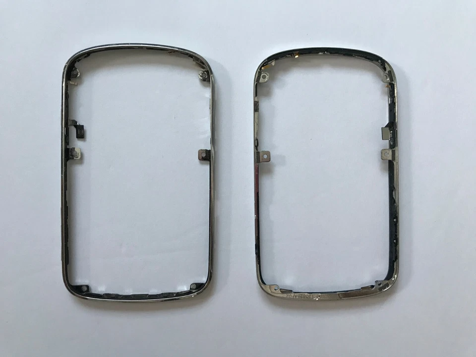 Marco exterior carcasa bisel plateado con botones OEM BlackBerry Bold Touch 9900 Foto 1 de 1