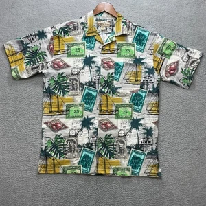 Camisa hawaiana de algodón con estampado de estampillas tropicales multicolor grande CARIBBEAN BLUES para hombre - Imagen 1 de 7
