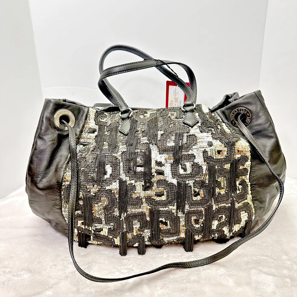 Bolso para mujer Valentino Garavani de cuero gris oscuro con lentejuelas precio de venta sugerido por el fabricante 3495 USD Foto 1 de 4