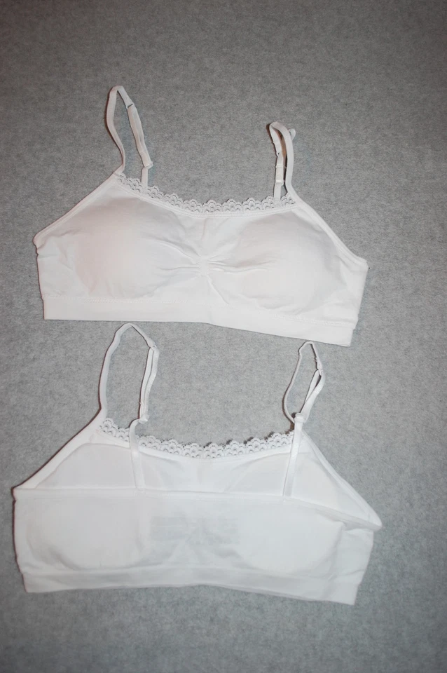 LOTE DE 2 SUJETADORES DEPORTIVOS SIN COSTURAS Pullover BLANCO / ENCAJE RIBETE ACOLCHADO 28 30 34 36 para niñas Foto 1 de 1
