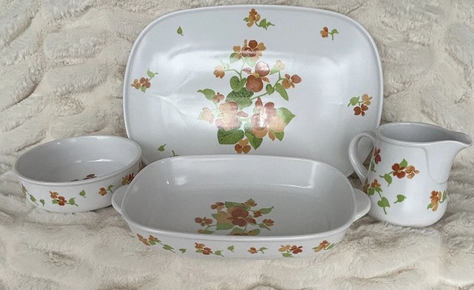 Juego de 4 piezas de servilletería Noritake Progression Happy Days vintage usado en excelente estado Foto 1 de 4