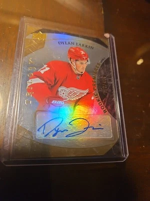 Dylan Larkin Rookie Premieres Upper Deck Trilogy #153. #92/499 Gold Rainbow Auto - Image 1 of 3