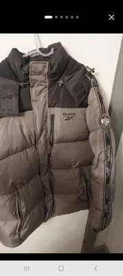Chaqueta acolchada Reebok para hombre talla XL negra y gris excelente estado Foto 1 de 4