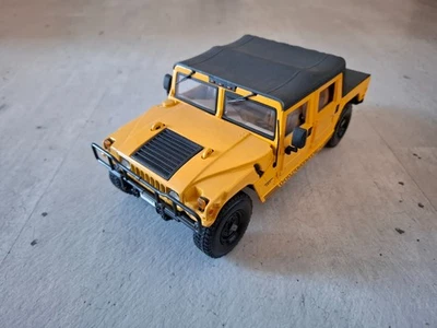 Hummer H1 Soft Top, giallo, 1:18, Maisto - Immagine 1 di 4