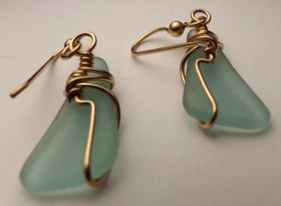 VTG YELLOW GOLD FILL ARTIST WIRE WORK WRAP SOFT BLUE SEA GLASS PIERCE EARRINGS - Image 1 of 3