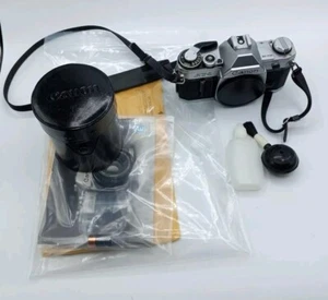 Vintage Canon AT-1 35mm Film Camera with Tiffen 55mm Sky 1-A Lens - Picture 1 of 21
