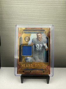 2023 Panini Gold Standard Heart of Gold Threads #12 Aidan Hutchinson/199 