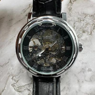 Reloj Automático Winner Hombre Tono Plateado Esqueleto Cuadrante 39MM Banda Negra 9 Pulgadas Foto 1 de 4