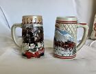 Two Budweiser Clydesdale Horse Holiday Ceramic Beer Steins for sale