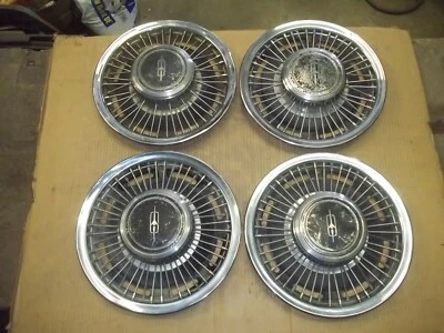 69 70 Oldsmobile F85 Cutlass Tapacubos Llanta Cubierta RADIOS DE ALAMBRE 14" FABRICANTE DE EQUIPOS ORIGINALES USADO 4016 Foto 1 de 4