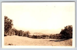 Postcard Unidentified RPPC, Scenic View, Field, Tree Line, Mountains Beyond - Picture 1 of 2