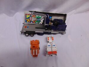 lot of Vintage 1980's Transformers Tractor Trailer , orange car #12 robot legs