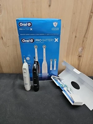 Cepillo de dientes a batería Oral-B Pro Advantage (2 asas + 4 cabezales de cepillo) Foto 1 de 2