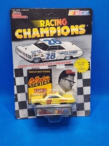 RACING CHAMPIONS #27 BANJO MATTHEWS WITH CARD AND DISPLAY STAND 1992, 1/64 SCALE