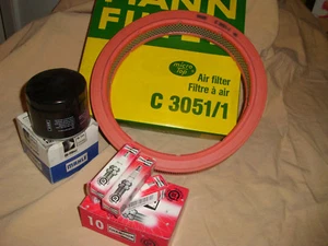4 spark plugs champion + air filter oil filter Volvo 340 1.4 1.7 343 344 345 - Picture 1 of 1