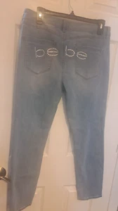 NEU MIT ETIKETT "BEBE" DENIM JEANS MIT ZAUBER-LOGO AUF DEN GESÄSSTASCHEN PONCE HELLE FARBE GRÖSSE 30 - Bild 1 von 14