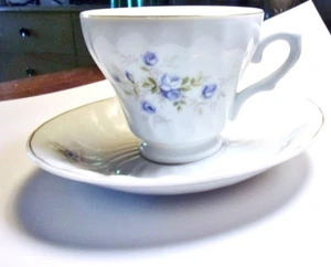 DesignPac Inc. - White With Blue Roses on Porcelain Tea Cup & Saucer Set - Picture 1 of 5