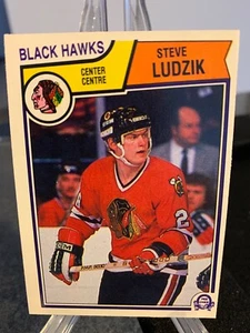 1983-84 O-Pee-Chee Steve Ludzik ( Larmer ) *Error* #106 - Chicago Blackhawks - Picture 1 of 2