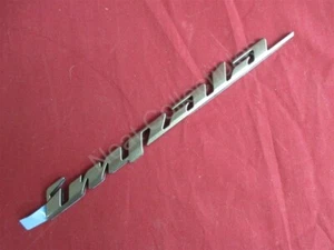 NOS OEM Chevrolet Impala Trunk Lid Nameplate Emblem 2000 - 03 BRONZE (76U) - Picture 1 of 5