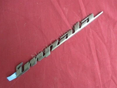 Placa de identificación emblema tapa maletero Chevrolet Impala 2000-03 bronce (76U) nuevo de lote original Foto 1 de 4