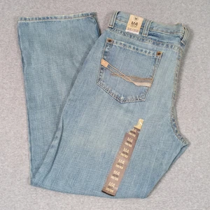 Pantalones de mezclilla Ariat M4 para hombre 38x32,5 tiro bajo corte bota lavado ligero desgastado occidental NUEVO - Imagen 1 de 15