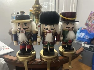 3 Nutcracker Stocking Holders Wood With Metal Base Red, Blue, Green - Picture 1 of 11