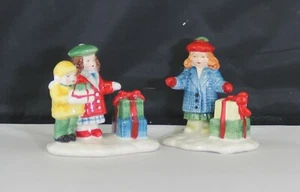 Department 56 Snow Village Shopping Girls With Packages 50962 - Picture 1 of 2