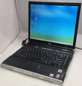 FOR PARTS 14.1" HP Pavilion ZE2000 (Turion 64 ML-30/1.60 GHz/NO RAM/NO HDD) - Picture 1 of 9