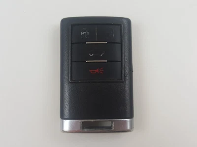 ORIGINAL CADILLAC 08-13 DTS CTS KEY LESS ENTRY REMOTE FOB DRIVER#1 ALARM USA GM - Image 1 of 4