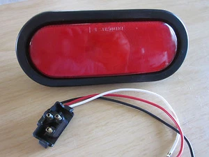 Two 6.5 Inch Tail Turn Light Oval W/ Gromet and Pigtail Camper Trailer RV NOS - Bild 1 von 1