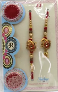 Schönes Bhaiya Bhabhi Rakhi Set / Band mit Reis und Kumkum Rakhi für Bruder - Bild 1 von 1