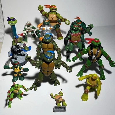 Lote de 14 figuras de acción Teenage Mutant Ninja Turtles la mayoría de 2002 2003 TMNT Foto 1 de 4