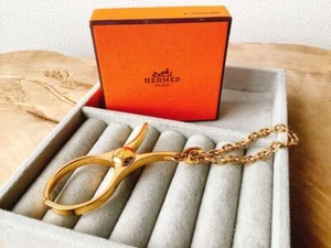 Gebrauchter HERMES Handschuhhalter Gold Metall mit Box für Damen Handschuhclip Metall - Bild 1 von 6