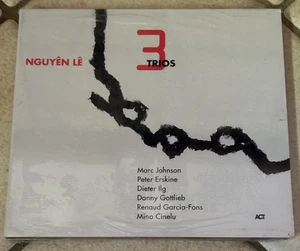NEW 3 Trios CD - NGUYEN LE Act Music - Marc Johnson, Dieter Ilg, Mino Cinelu - Foto 1 di 4