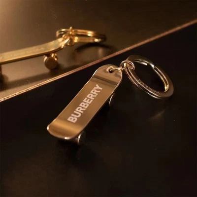 Burberry Gold-Tone Metal Skateboard Keychain / Key Ring – Logo Engraved - Image 1 of 4