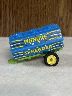 Accesorio de tractor vintage 1:64 tirar detrás esparcidor de estiércol juguete Foto 1 de 4