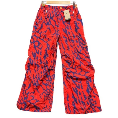 Pantalones de nailon Nike holgados de pierna recta naranja púrpura para hombre talla S ropa de calle Foto 1 de 4