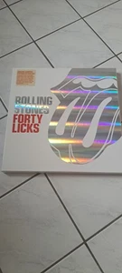 The Rolling Stones "Forty Licks" 2-CD - Box + Bildband + Mousepad (Zungenform) - Bild 1 von 5