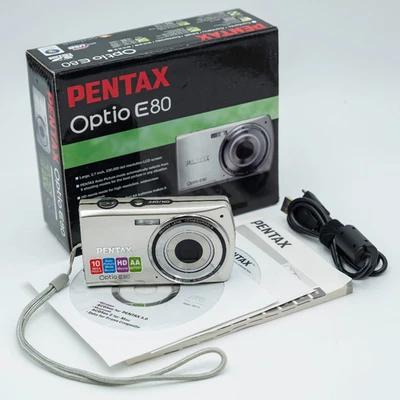 Pentax Optio E80 10.0 MP 3x Optical Zoom F2.9 Digital Camera - Silver ( READ ) - Image 1 of 4