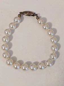 Brazalete para mujer de 7,5" cadena de perlas de imitación con cordón de nailon broche dorado  - Imagen 1 de 5