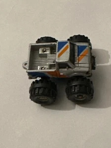 Micro Machines DATSUN Monster Truck 4x4 Silver W Orange Blue Stripe 1987 - Picture 1 of 5